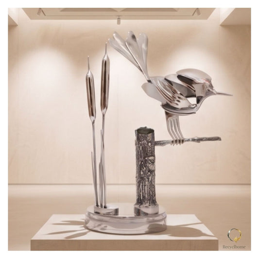 Sur son perchoir, sculpture en métal recyclé fait main par Recyclhome
